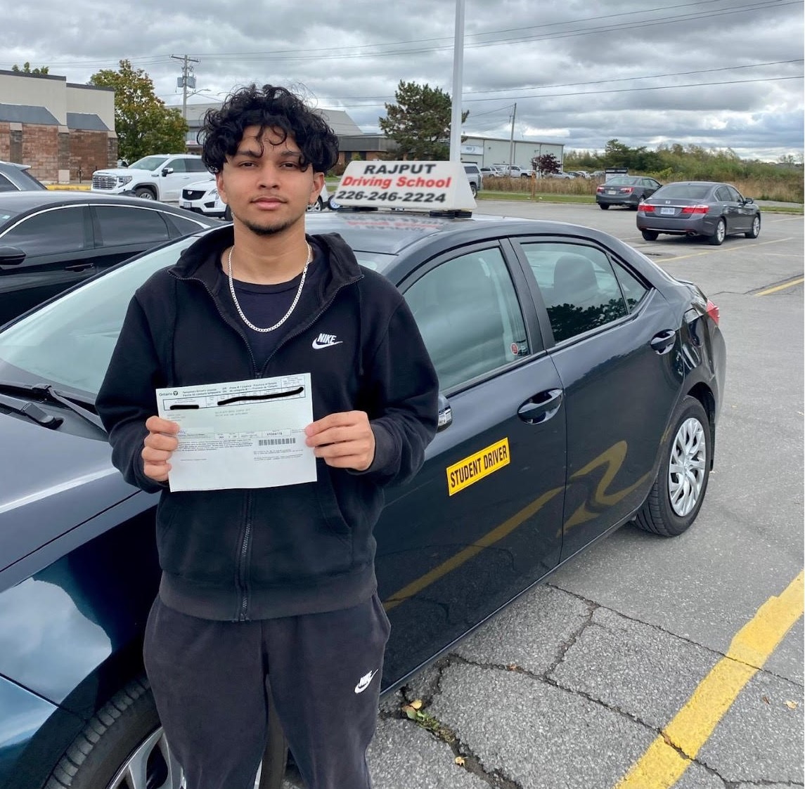 Teen girl in car taking traing lessons for her G2 test in Windsor